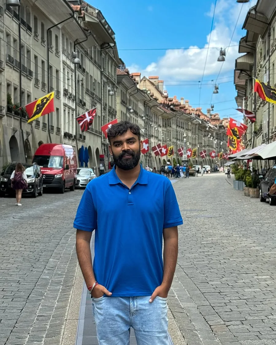 Siddhant Sharma in his original blue polo photograph